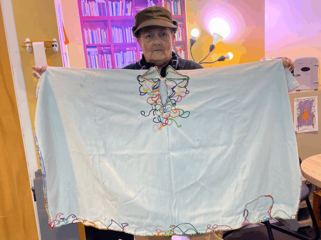 Gretchen "Skeeter" Schlager with a homemade poncho.