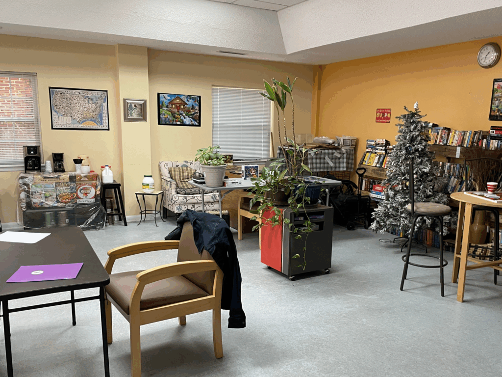 Two Thirds of "the Room," filled with donated and restored art, goods, and furniture.