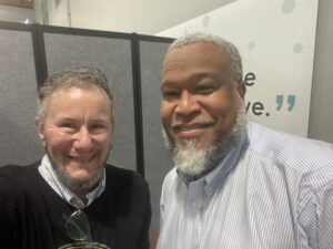 Dewayne Brown from Urban Ministry's Hope Day Center (r) and Sam Peterson, Aging Well Durham (l).